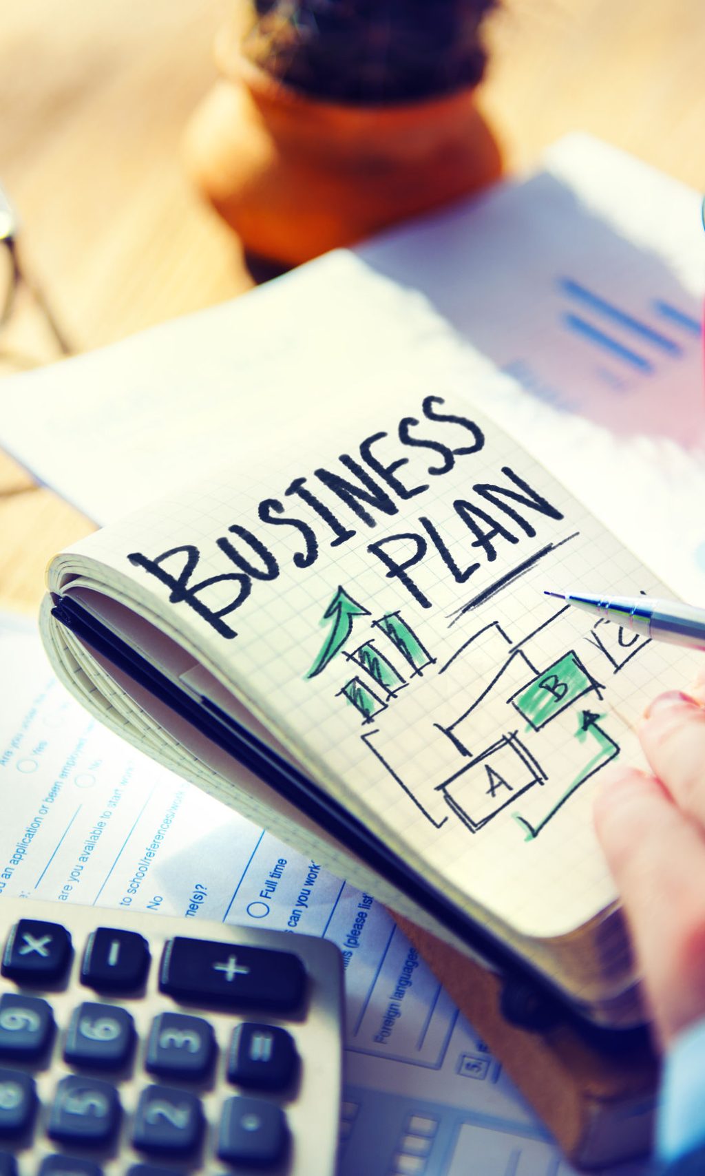 35337758 - businessman writing business plan growth concept