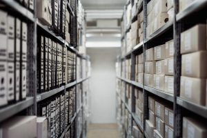 Archive, boxes, shelf — Max Herve George Creates Long-Term Value Through Thoughtful Expansion